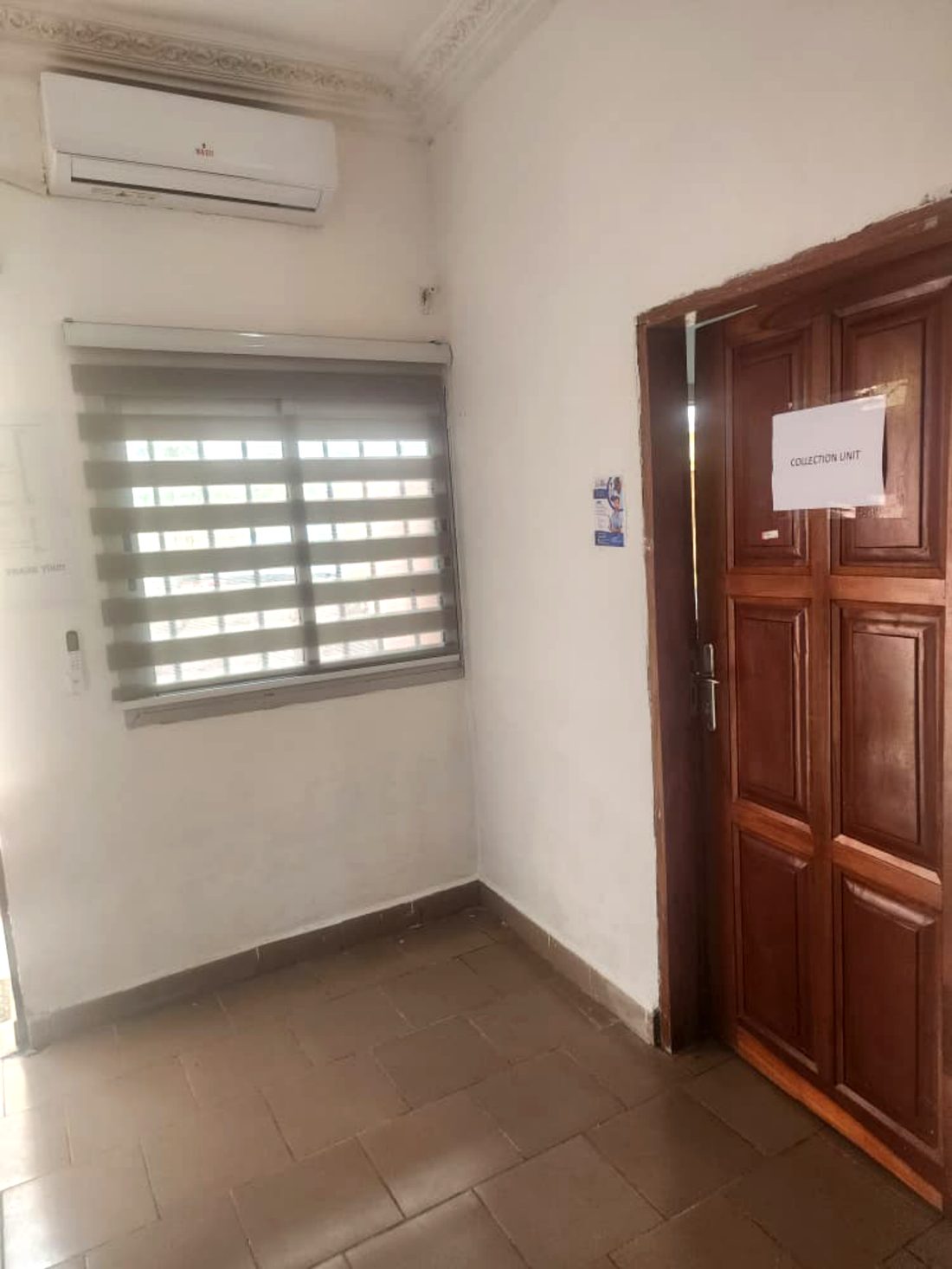 Sample collection unit door